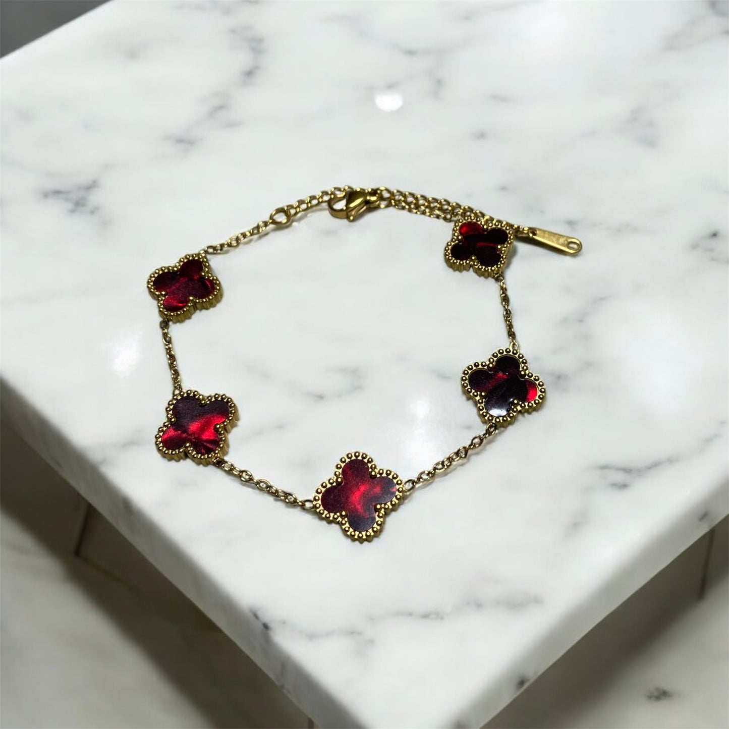 pulsera de trebol van cleef vinotinto marmoleado