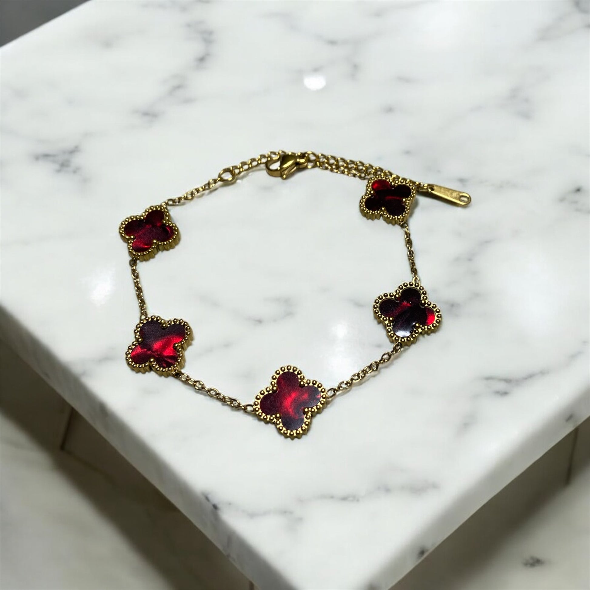 pulsera de trebol van cleef vinotinto marmoleado