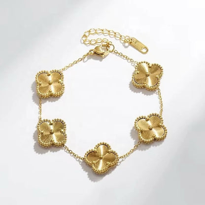 pulsera de trebol van cleef dorada
